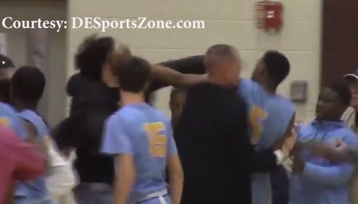 A witness says the players’ bench at the game was extremely close to the stands, and that may have been one factor that led to the fight. (Source: DE Sports Zone/WBOC/CNN)