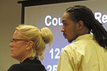 Attorney Lori Pedego stands in a Lompoc courtroom alongside her client, Ali Mohammed. He is one of two former Allan Hancock College basketball players on trial for the fatal shooting of Terence Richardson on Dec. 30, 2014 in Santa Maria.