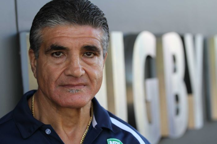 Former rugby league player Mario Fenech standing in front of Rugby League HQ in Sydney