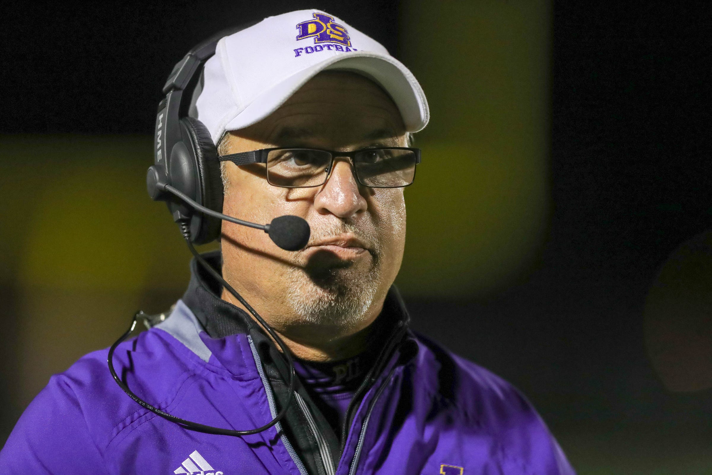 Warren De La Salle coach Mike Giannone on the sideline during the first half of a game Oct. 5, 2018 at Davison High School.