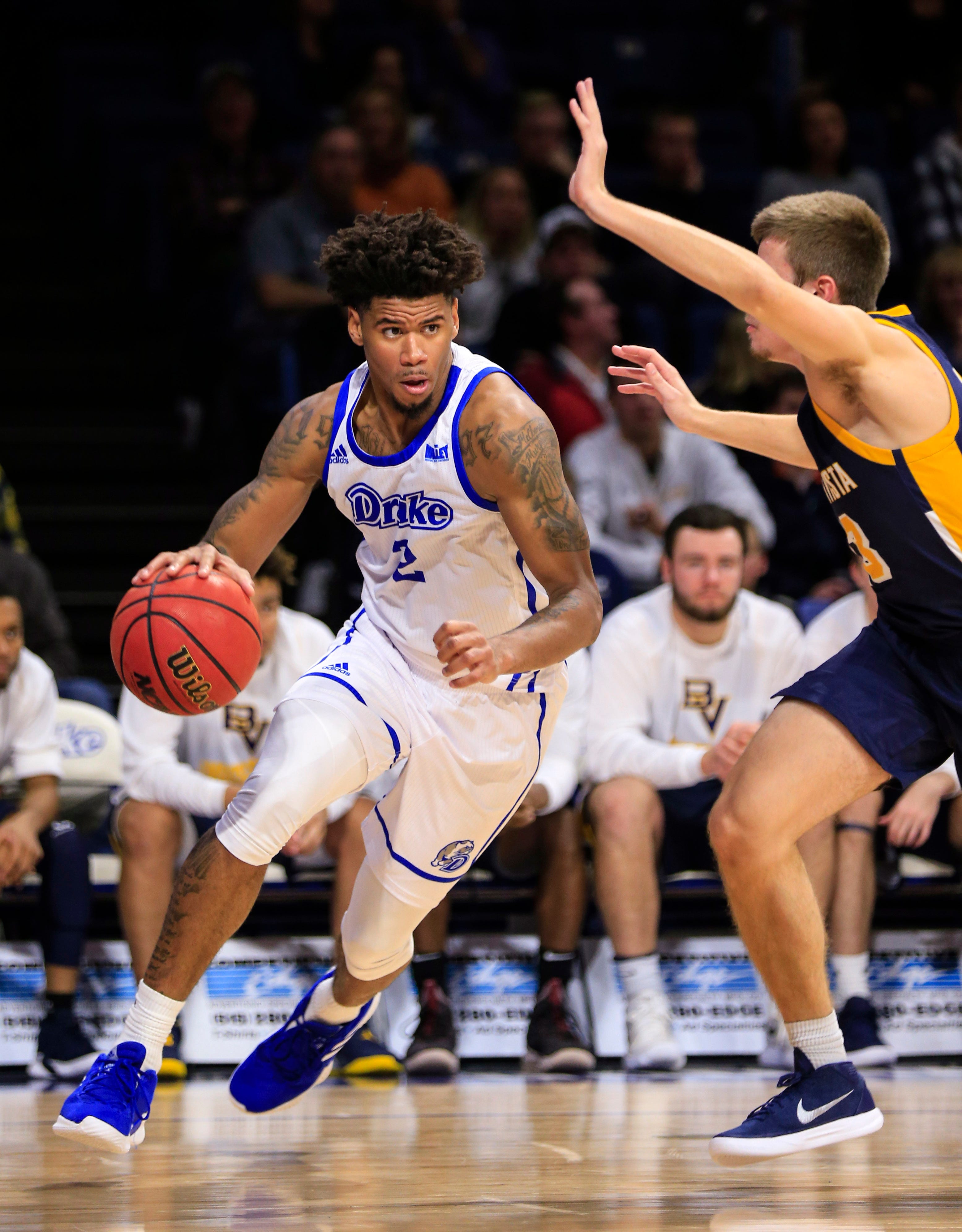 Drake's Tremell Murphy drives to the basket during a game against Buena Vista at the Knapp center Thursday, Nov. 8, 2018.