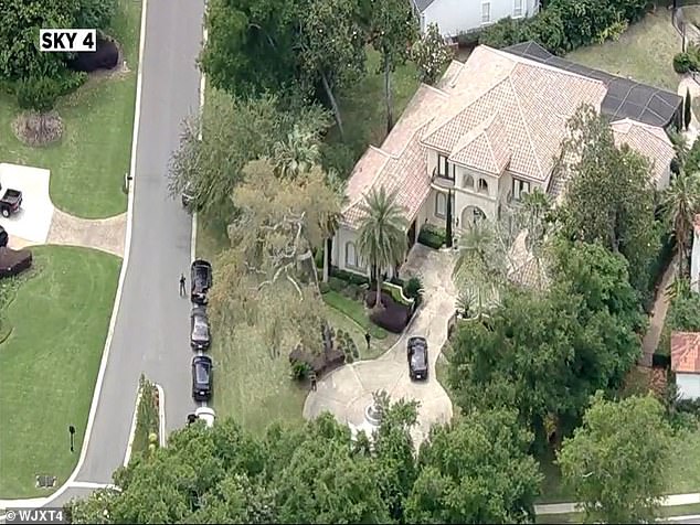 A SWAT team searched his home in the Queen's Harbor gated community in Florida ON Wednesday afternoon