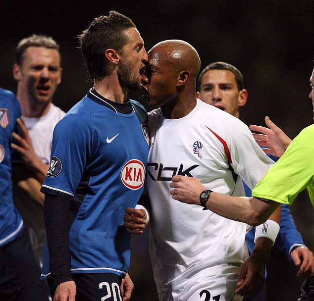 The Senegal international squares up to Atletico Madrid's Simao in a UEFA Cup fixture