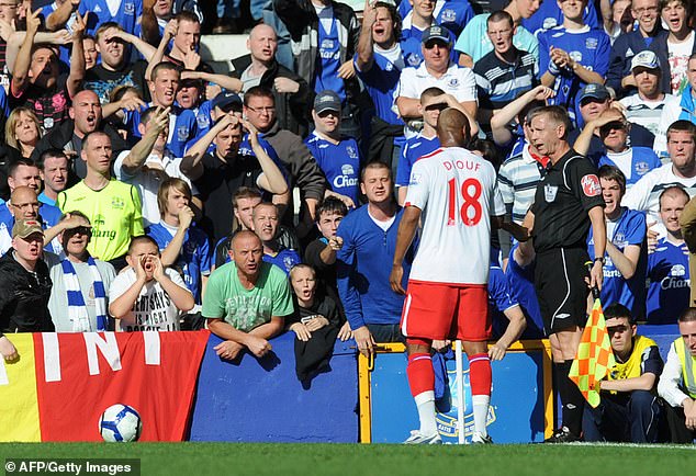 Diouf confronts Everton fans in the match he allegedly made a racial slur at a ball boy