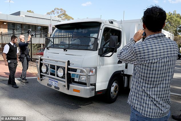 A prison van believed to be transporting former West Coast Eagles AFL player Ben Cousins leaves the Armadale Magistrates Court in Perth on Thursday