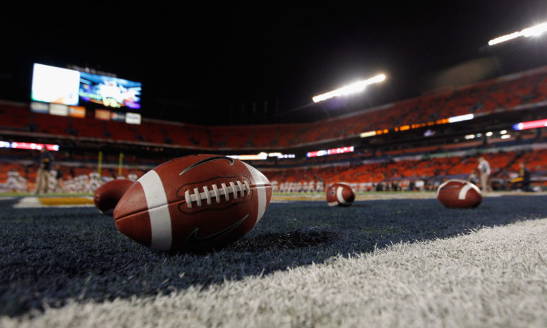 Generic photo of footballs in an end zone.