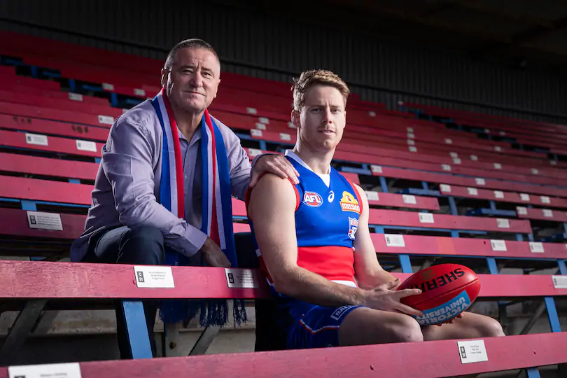 Lachie Hunter with his father, former Footscray Bulldogs player Mark Hunter.