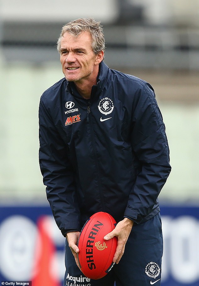 Dean Laidley in happier days while acting as a coach at Carlton in the AFL. Former Blues coach Mick Malthouse sdaid he was aware Laidley had health issues before his arrest