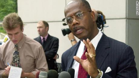 Fulton County District Attorney Paul Howard addresses members of the media outside of Fulton County Superior Court in Atlanta after Ray Lewis pleaded quilty to a misdemeanor in June 2000.