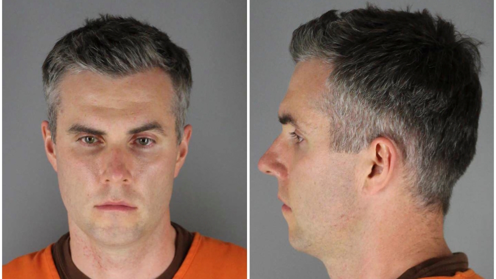 Former Minnesota police officer Thomas Lane poses for a booking photograph in Minneapolis